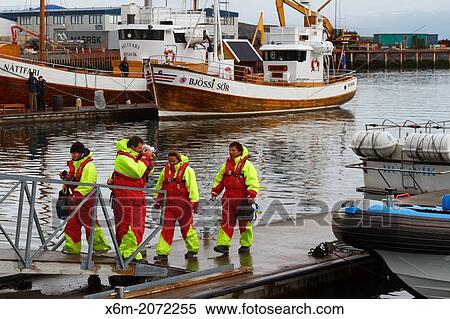 Tourists in harbour. Husavik. Iceland, Europe. View Large Photo Image Stock Photography - Tourists in harbour. Husavik. Iceland, Europe.. Fotosearch