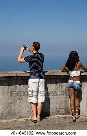 Stock Image - Tourists in Mount Corcovado. Rio de Janeiro, Brazil.. Fotosearch