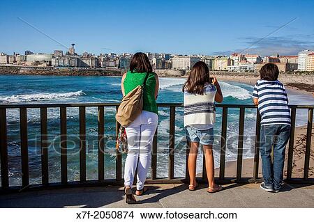 Tourists in Orzan beach, Corua city, Galicia, Spain. View Large Photo Image Picture - Tourists in Orzan beach, Corua city, Galicia, Spain.. Fotosearch