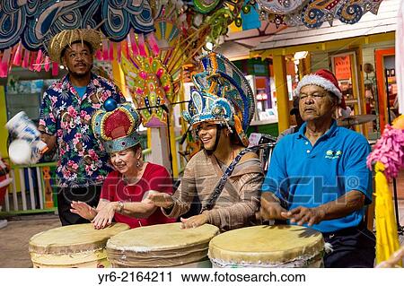 Tourists just off a cruise ship join in the carnival at Prince George Wharf, Nassau, Bahamas, Caribbean. View Large Photo Image Stock Image - Tourists just off a cruise ship join in the carnival at Prince George Wharf, Nassau, Bahamas, Caribbean.. Fotosearch