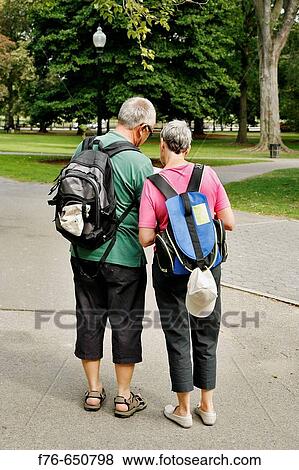 Tourists looking at map, Boston Commons, Boston, MA View Large Photo Image Stock Photo - Tourists looking at map, Boston Commons, Boston, MA. Fotosearch