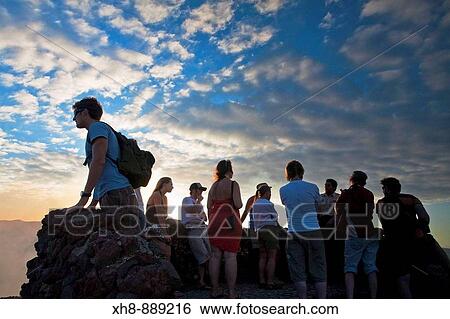 Tourists looking at volcanic eruptions from Bobadilla Cross, Masaya Volcano National Park, Masaya, Nicaragua View Large Photo Image Stock Photograph - Tourists looking at volcanic eruptions from Bobadilla Cross, Masaya Volcano National Park, Masaya, Nicaragua. Fotosearch