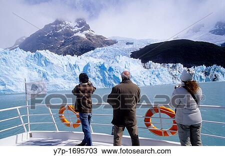 Tourists on a boat at the Upsala Glacier, Lago Argentino, Parque Nacional Los Glaciares, Patagonia, Argentina View Large Photo Image Stock Image - Tourists on a boat at the Upsala Glacier, Lago Argentino, Parque Nacional Los Glaciares, Patagonia, Argentina. Fotosearch