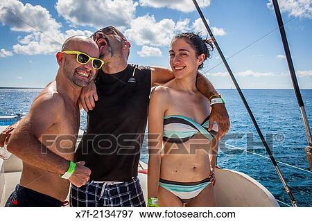 Stock Photo - Tourists on a catamaran, journey in Saona island, Dominican Republic.. Fotosearch
