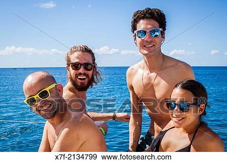 Tourists on a catamaran, journey in Saona island, Dominican Republic. View Large Photo Image Stock Photo - Tourists on a catamaran, journey in Saona island, Dominican Republic.. Fotosearch