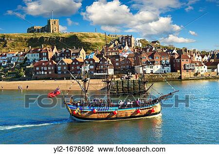 Tourists on a Pirate boat in Whitby harbour North Yorkshire, England View Large Photo Image Stock Image - Tourists on a Pirate boat in Whitby harbour North Yorkshire, England. Fotosearch