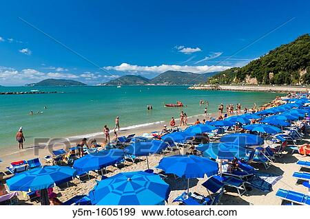 Tourists on the beach, Lerici, Province of La Spezia, Liguria, Italy, Europe View Large Photo Image Stock Photo - Tourists on the beach, Lerici, Province of La Spezia, Liguria, Italy, Europe. Fotosearch