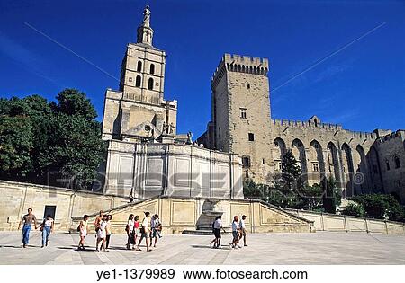 Tourists outside the Palace of the Popes and the Notre Dame des Doms, Avignon, Provence, France View Large Photo Image Stock Photo - Tourists outside the Palace of the Popes and the Notre Dame des Doms, Avignon, Provence, France. Fotosearch