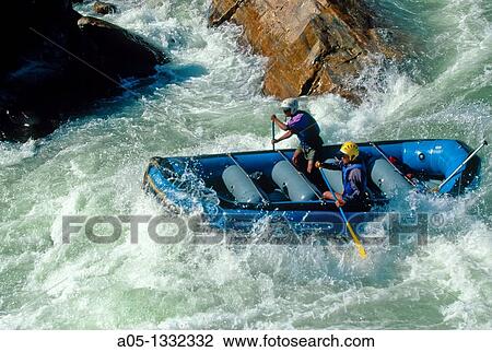 Stock Image - TOURISTS RAFTING ON BHOTE KOSI RIVER HIMALAYA NEPAL.. Fotosearch