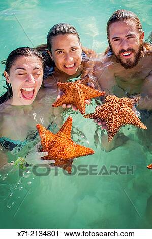 Stock Image - Tourists, Saona island, Dominican Republic.. Fotosearch