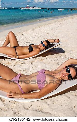 Stock Image - Tourists, Saona island, Dominican Republic.. Fotosearch