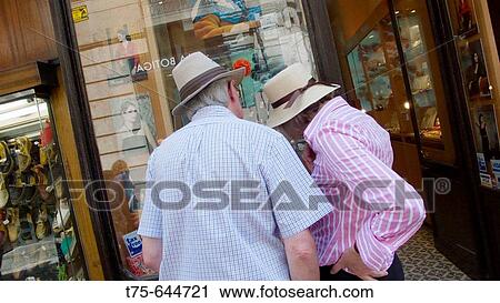 Stock Image - Tourists shopping. Barcelona. Spain.. Fotosearch