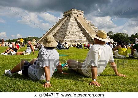 Tourists viewing El Castillo Pyramid of Kukulcan? The Castle? during the fall equinox at the Mayan site of Chichen Itza, Mexico View Large Photo Image Stock Photo - Tourists viewing El Castillo Pyramid of Kukulcan? The Castle? during the fall equinox at the Mayan site of Chichen Itza, Mexico. Fotosearch