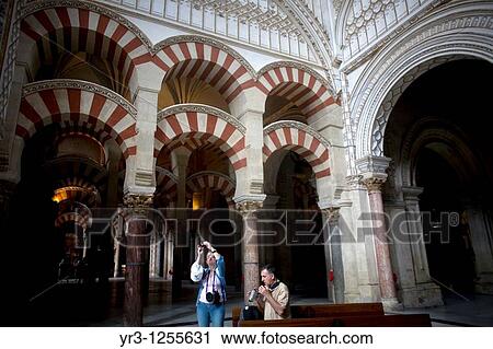 Tourists visit the Mosque and Cathedral of Cordoba, Andalusia, Spain. View Large Photo Image Stock Image - Tourists visit the Mosque and Cathedral of Cordoba, Andalusia, Spain.. Fotosearch