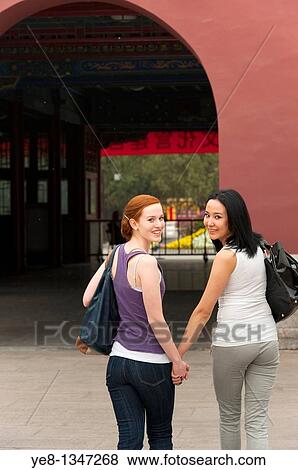 Tourists visiting The Forbidden City, looking backwards, Beijing, China, Asia MR View Large Photo Image Stock Photo - Tourists visiting The Forbidden City, looking backwards, Beijing, China, Asia MR. Fotosearch