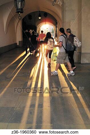 Tourists walks into Cloth Hall, Krakow, Poland. View Large Photo Image Stock Image - Tourists walks into Cloth Hall, Krakow, Poland.. Fotosearch