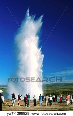 Tourists watching Strokkur Geyser, Iceland View Large Photo Image Stock Photo - Tourists watching Strokkur Geyser, Iceland. Fotosearch