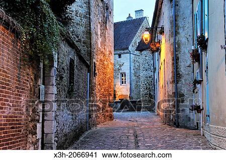 Stock Image - Toussaint street, Mortagne-au-Perche, Regional Natural Park of Perche, Orne department, Lower Normandy region, France, Western Europe.. Fotosearch