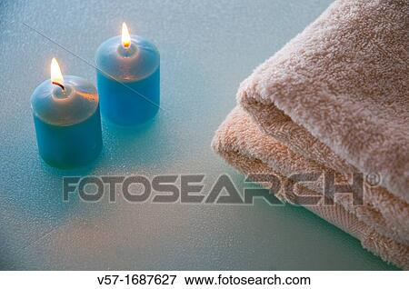 Towels and candles View Large Photo Image Stock Photo - Towels and candles. Fotosearch