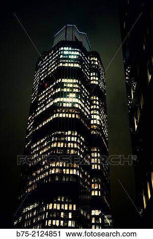 Tower 42 building, at night with the lights on in the windows. London, England, UK View Large Photo Image Stock Image - Tower 42 building, at night with the lights on in the windows. London, England, UK. Fotosearch