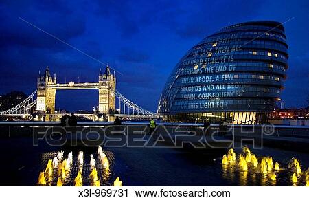 Tower Bridge and City Hall over the Thames River at Night, London United Kingdom View Large Photo Image Stock Image - Tower Bridge and City Hall over the Thames River at Night, London United Kingdom. Fotosearch