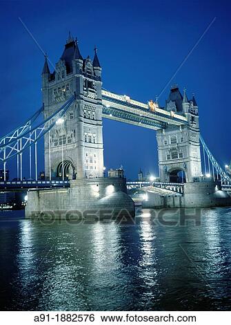 Tower Bridge over River Thames at night, London, England, UK View Large Photo Image Stock Photograph - Tower Bridge over River Thames at night, London, England, UK. Fotosearch