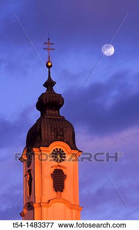 Tower of the most beautiful village church in the world in Steinhausen / Upper Swabia View Large Photo Image Stock Photo - Tower of the most beautiful village church in the world in Steinhausen / Upper Swabia. Fotosearch