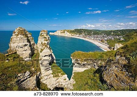 Town and Porte d? Amont cliff as seen from the Porte d? Aval cliff, Etretat. Seine-Maritime, Haute-Normandie, France View Large Photo Image Stock Image - Town and Porte d? Amont cliff as seen from the Porte d? Aval cliff, Etretat. Seine-Maritime, Haute-Normandie, France. Fotosearch