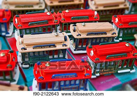 Stock Image - Toy streetcars sold in Chinatown San Francisco, CA.. Fotosearch