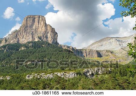Stock Photography - Tozal del Mallo in Ordesa Valley, declarated World Heritage by UNESCO, and belonging to Ordesa y Monte Perdido National Park Pyrenees Torla Huesca province Arag? n Spain. Fotosearch