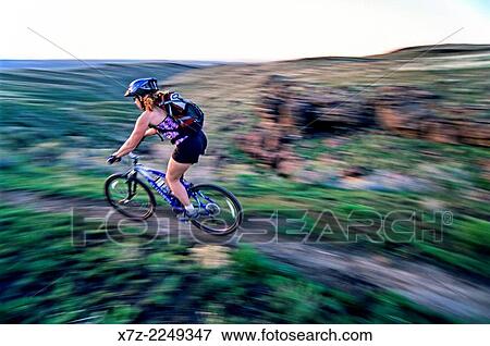 Tracey Weber mountain biking the Indian Springs Trails in the Goose Creek Mountains in southern Idaho. View Large Photo Image Stock Photo - Tracey Weber mountain biking the Indian Springs Trails in the Goose Creek Mountains in southern Idaho.. Fotosearch