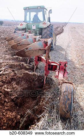 Stock Photo - Tractor ploughing field. Leon province. Spain. Fotosearch