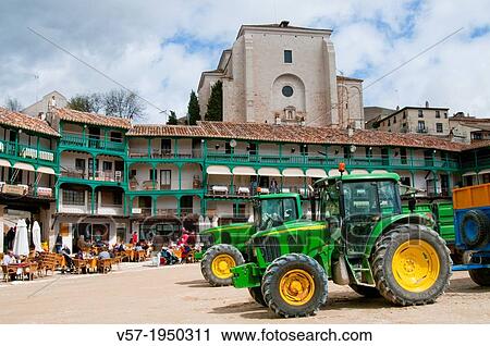 Stock Image - Tractors and terraces in the Main Square. Chinchon, Madrid province, Spain.. Fotosearch
