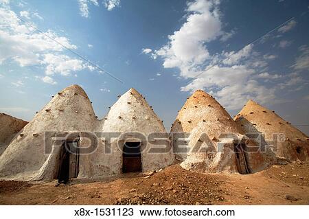 Traditional beehive houses in Sarouj village, Hama, Syria View Large Photo Image Stock Image - Traditional beehive houses in Sarouj village, Hama, Syria. Fotosearch