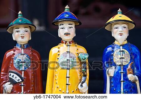 Picture - Traditional Chinese ceramic figurines in a market, Pingyao, Shaanxi Province, China.. Fotosearch