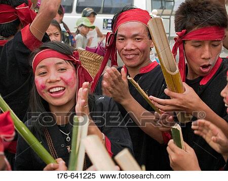 Traditional dancers making merry at the Songkran Lao New Year, Luang Prabang, Laos View Large Photo Image Stock Photography - Traditional dancers making merry at the Songkran Lao New Year, Luang Prabang, Laos. Fotosearch