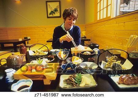 Traditional dinner in a? ryokan? in Tsumago, Kiso valley. Central Honshu, Japan View Large Photo Image Stock Photo - Traditional dinner in a? ryokan? in Tsumago, Kiso valley. Central Honshu, Japan. Fotosearch