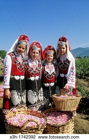 traditional dressed young girls in a rose garden during the Rose Festival in the Rose Valley, Kazanlak, Bulgaria, Europe View Large Photo Image Stock Image - traditional dressed young girls in a rose garden during the Rose Festival in the Rose Valley, Kazanlak, Bulgaria, Europe. Fotosearch