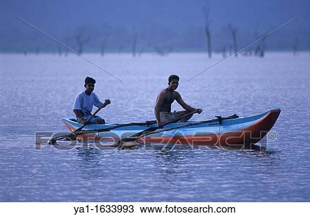 Traditional fishing boat, Dambulla lake, Sri Lanka View Large Photo Image Stock Image - Traditional fishing boat, Dambulla lake, Sri Lanka. Fotosearch