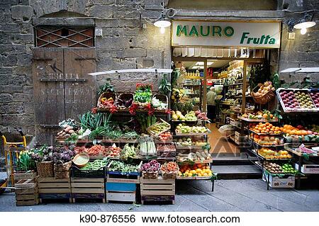 Traditional grocery store selling fruit and vegetable - and a pushcart besides - in a side street of the heart of Florence (Firenze), Tuscany, Italy, Southern Europe View Large Photo Image Stock Photograph - Traditional grocery store selling fruit and vegetable - and a pushcart besides - in a side street of the heart of Florence (Firenze), Tuscany, Italy, Southern Europe. Fotosearch