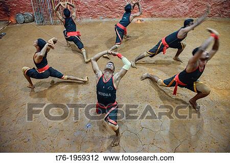 Stock Image - traditional kallaripayattu martial arts practicioners in Kerala, India.. Fotosearch