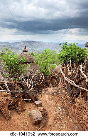 Traditional Konso village on a mountain ridge overlooking the rift valley The Konso are living in tradtional villages with compunds for each family. Africa, East Africa, Ethiopia, Konso, February 2010 View Large Photo Image Stock Image - Traditional Konso village on a mountain ridge overlooking the rift valley The Konso are living in tradtional villages with compunds for each family. Africa, East Africa, Ethiopia, Konso, February 2010. Fotosearch