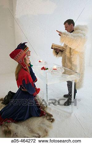 Traditional Lapp wedding in the ice hall of Hotel Kakslauttanen. Lapland. Ivalo. Finlandia View Large Photo Image Stock Image - Traditional Lapp wedding in the ice hall of Hotel Kakslauttanen. Lapland. Ivalo. Finlandia. Fotosearch