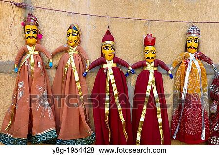 Traditional Rajasthani puppet dolls on sale as souvenirs, Jaisalmer, India. View Large Photo Image Stock Photo - Traditional Rajasthani puppet dolls on sale as souvenirs, Jaisalmer, India.. Fotosearch