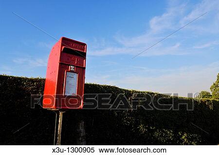 Traditional red post box at the village of Redhill, Somerset England, United Kingdom View Large Photo Image Stock Photography - Traditional red post box at the village of Redhill, Somerset England, United Kingdom. Fotosearch