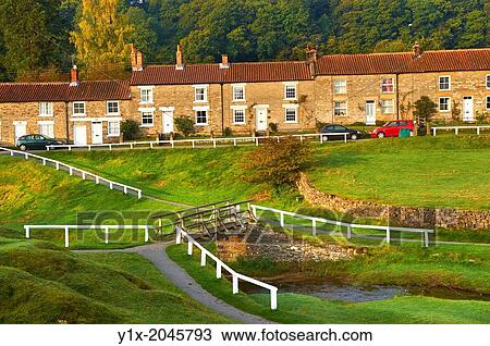 Traditional stone houses of Hutton Le Hole, North Yorks Moors National Park, Yorkshire, England. View Large Photo Image Stock Image - Traditional stone houses of Hutton Le Hole, North Yorks Moors National Park, Yorkshire, England.. Fotosearch