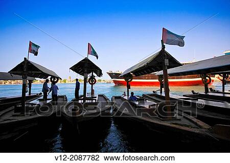 Traditional water taxi, Abra, Dubia Creek, district of Deira, Dubai, Emirate. Persian Gulf View Large Photo Image Stock Image - Traditional water taxi, Abra, Dubia Creek, district of Deira, Dubai, Emirate. Persian Gulf. Fotosearch