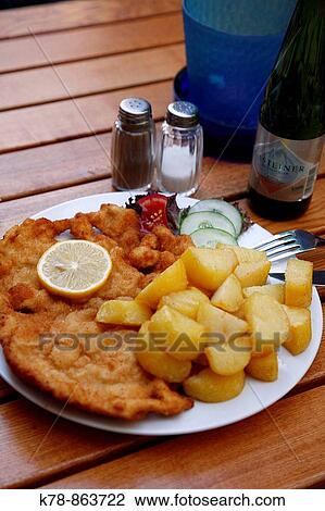 Traditional Wiener Schnitzel, Vienna, Austria View Large Photo Image Stock Image - Traditional Wiener Schnitzel, Vienna, Austria. Fotosearch