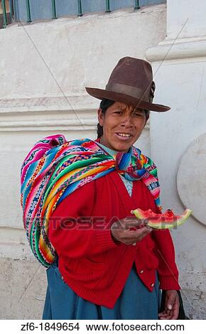 Traditional woman in costume and back pack in Cuzco Cusco Peru View Large Photo Image Picture - Traditional woman in costume and back pack in Cuzco Cusco Peru. Fotosearch