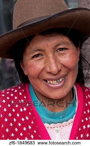Traditional woman in dress and hat in small town of Pisaq Peru View Large Photo Image Stock Image - Traditional woman in dress and hat in small town of Pisaq Peru. Fotosearch